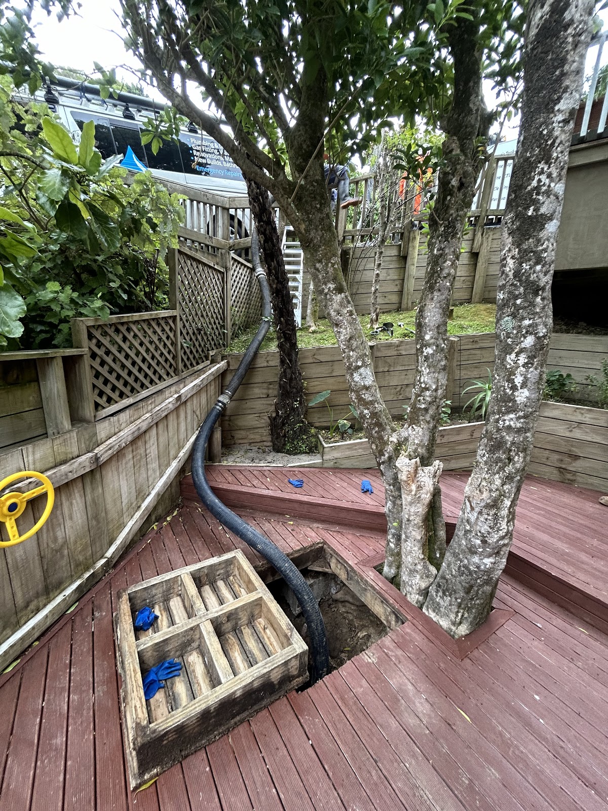 Emergency drainage work under a deck on a Hutt Valley property